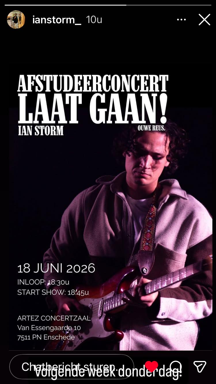 Ian Storm performing with electric guitar